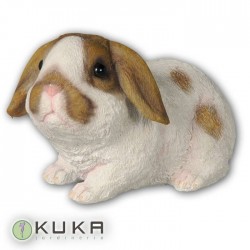 Figura conejo blanco con manchas marrones